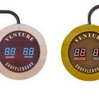 Two circular electronic scoreboards for Venture Monaco 18' Shuffleboard Table in solid white oak and yellow wood.