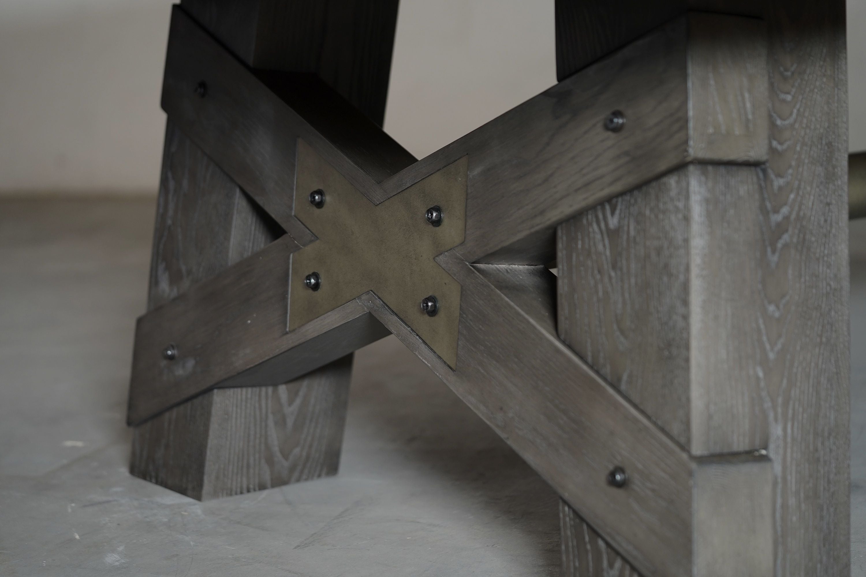 Close-up of Nixon Georgia 8' Pool Table leg with X-brace in Grayson Grey by Nixon Billiards.