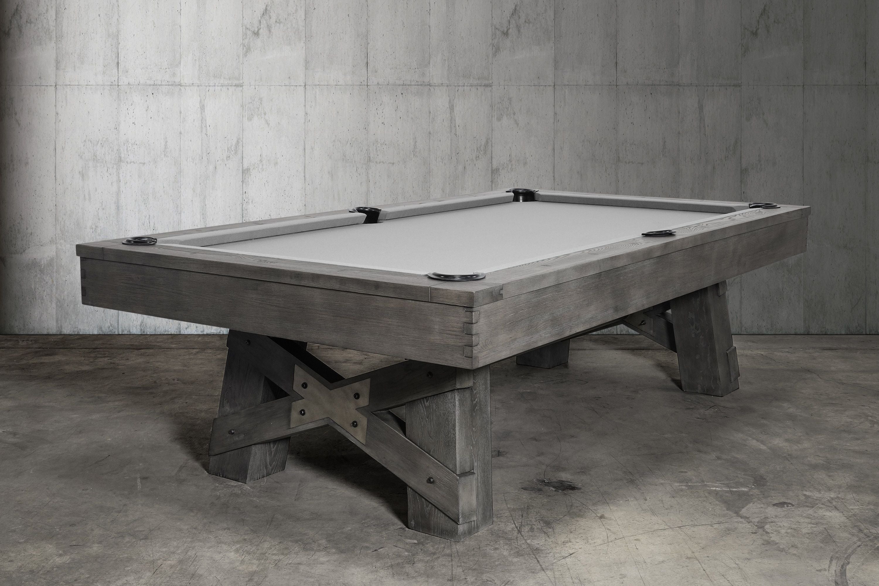 Nixon Georgia 8' Slate Pool Table in Grayson Grey by Nixon Billiards shown in industrial room.