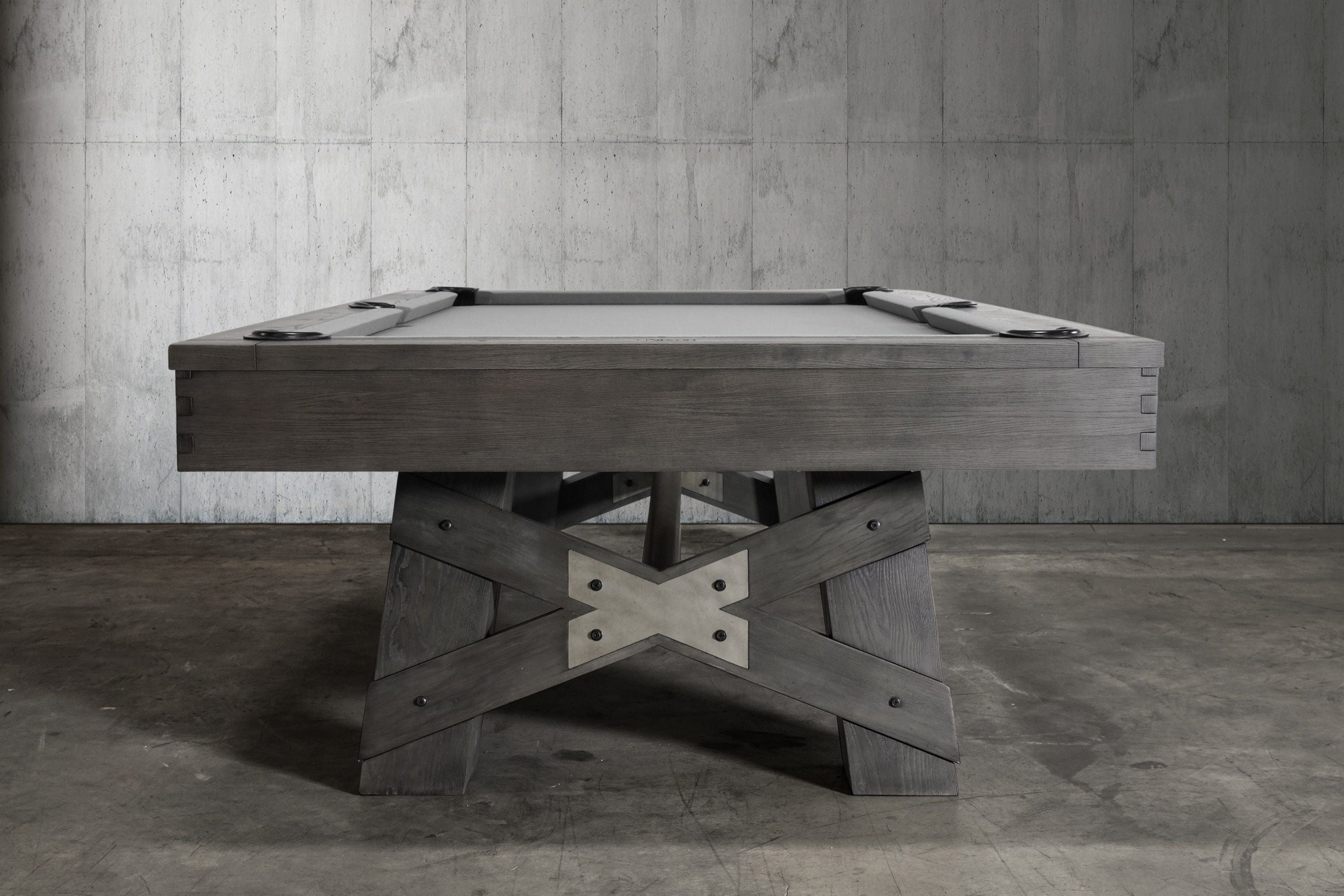 Nixon Georgia 7' Slate Pool Table in Grayson Grey by Nixon Billiards shown against concrete.
