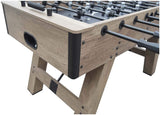 Close-up of the Hathaway Braxton 55'' Foosball Table with black handles and Barnwood finish.