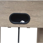 Close-up of the ball return slot on the Hathaway Braxton 55'' Foosball Table with a ball inside.