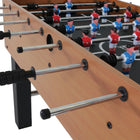 Close-up of a DMI Sports American Legend Charger 52" foosball table with red and blue players.