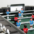 Players on a by DMI Sports Euro Star Foosball Table by Atomic available at Foosball Planet.