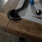 Corner of Nixon Hunter 7' Slate Pool Table in Brushed Walnut by Nixon Billiards with gray felt.