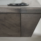 Close-up of Nixon Billiards Birdy 7' Slate Pool Table in Grayson Grey with visible wood grain.