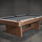 The Nixon KAI 7' Slate Pool Table by Nixon Billiards features a walnut finish and dark felt.