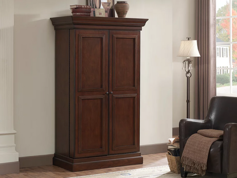 American Heritage Billiards Jordan Wine Cabinet in Navajo beside window and armchair in living room.