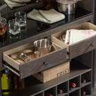 Access bar tools, napkins, glassware, and wine in the American Heritage Fairfield Wine Cabinet.