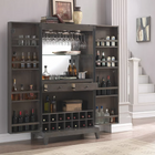 The American Heritage Billiards Fairfield Wine Cabinet in Glacier on Oak displays bottles and glasses.
