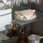 Glassware, plates, and bottles are displayed in the American Heritage Billiards Fairfield Wine Cabinet.