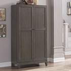 American Heritage Billiards Fairfield Wine Cabinet in Glacier on Oak stands near artwork and stairs.