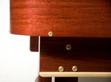 Close-up of the Venture Grand Deluxe 18' Shuffleboard Table with brass screws and white trim.