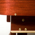 Close-up of the Venture Grand Deluxe 18' Shuffleboard Table with brass screws and white trim.