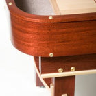 Close-up of a Venture Grand Deluxe 18' Shuffleboard Table with brass trim and light surface.