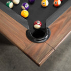 Corner of Nixon KAI 8' Slate Pool Table in Walnut by Nixon Billiards, balls racked for play.