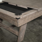 The Nixon Hunter 7' Slate Pool Table by Nixon Billiards features an antique finish and dining top.
