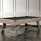 A Nixon Hunter 7' Slate Pool Table in Antique finish by Nixon Billiards sits on a concrete floor.