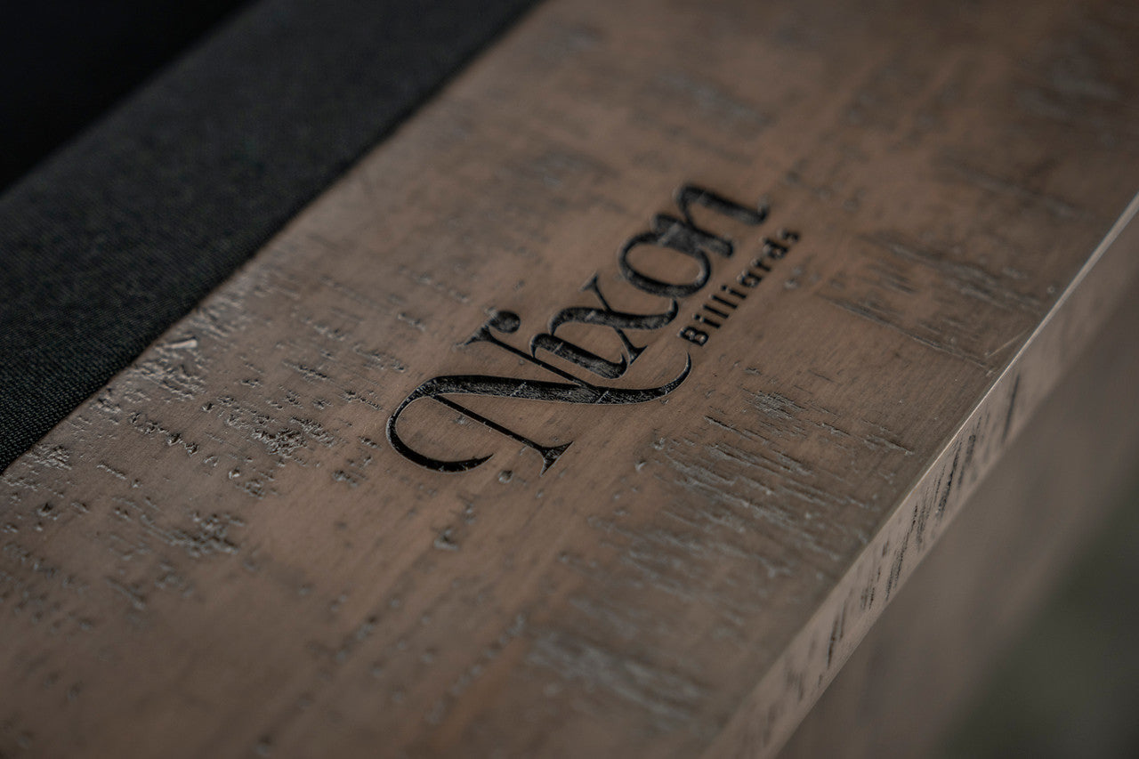 Close-up of the wooden surface on the Nixon Hunter 7' Slate Pool Table by Nixon Billiards.