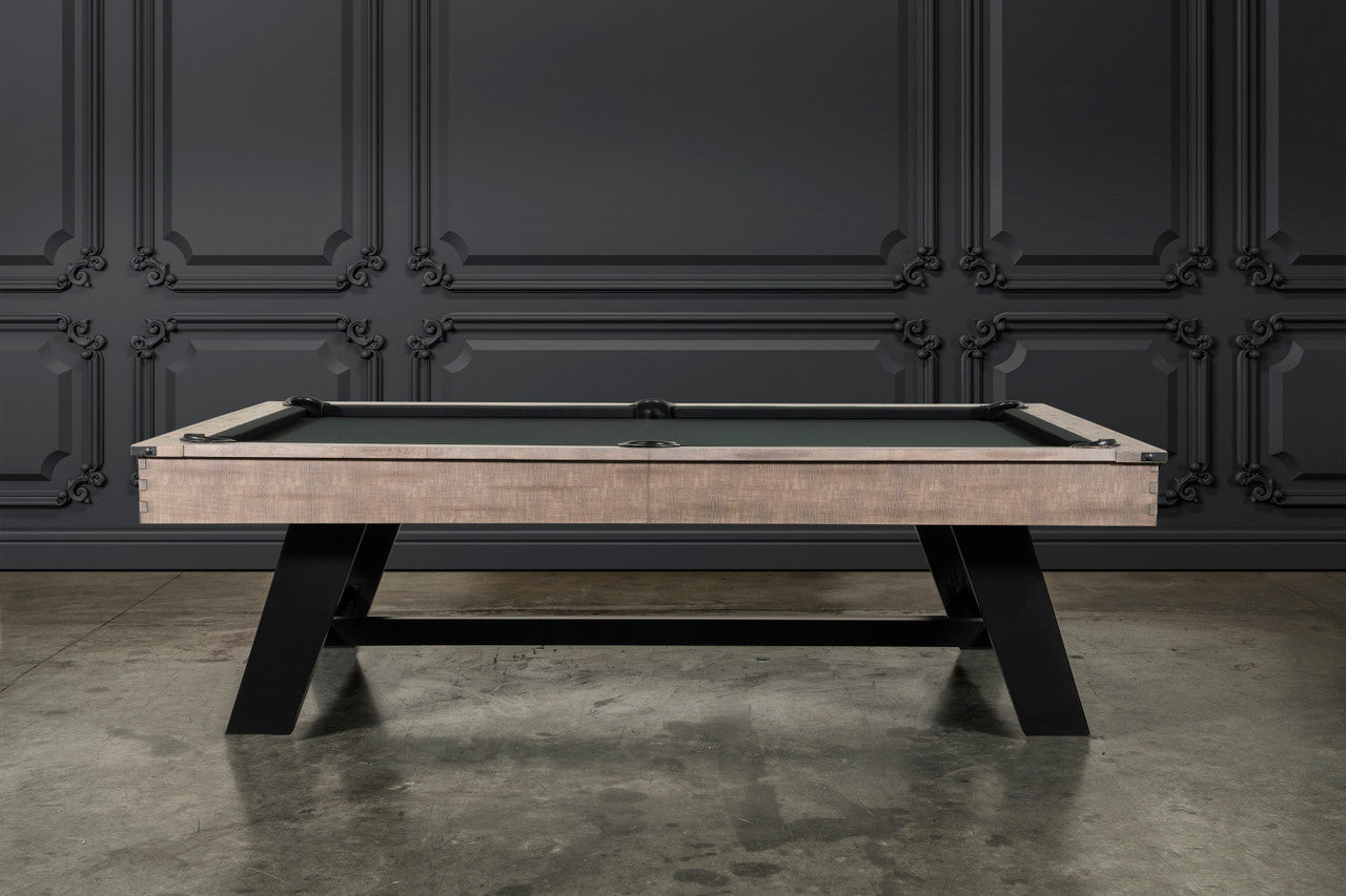 Nixon Hunter 7' Slate Pool Table in Antique Finish by Nixon Billiards against a dark wall.