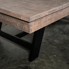 Close-up of Nixon Hunter 7' Slate Pool Table in Antique Finish by Nixon Billiards on concrete floor.