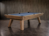 The Nixon Desyn 8' Slate Pool Table by Nixon Billiards features blue felt and walnut finish.