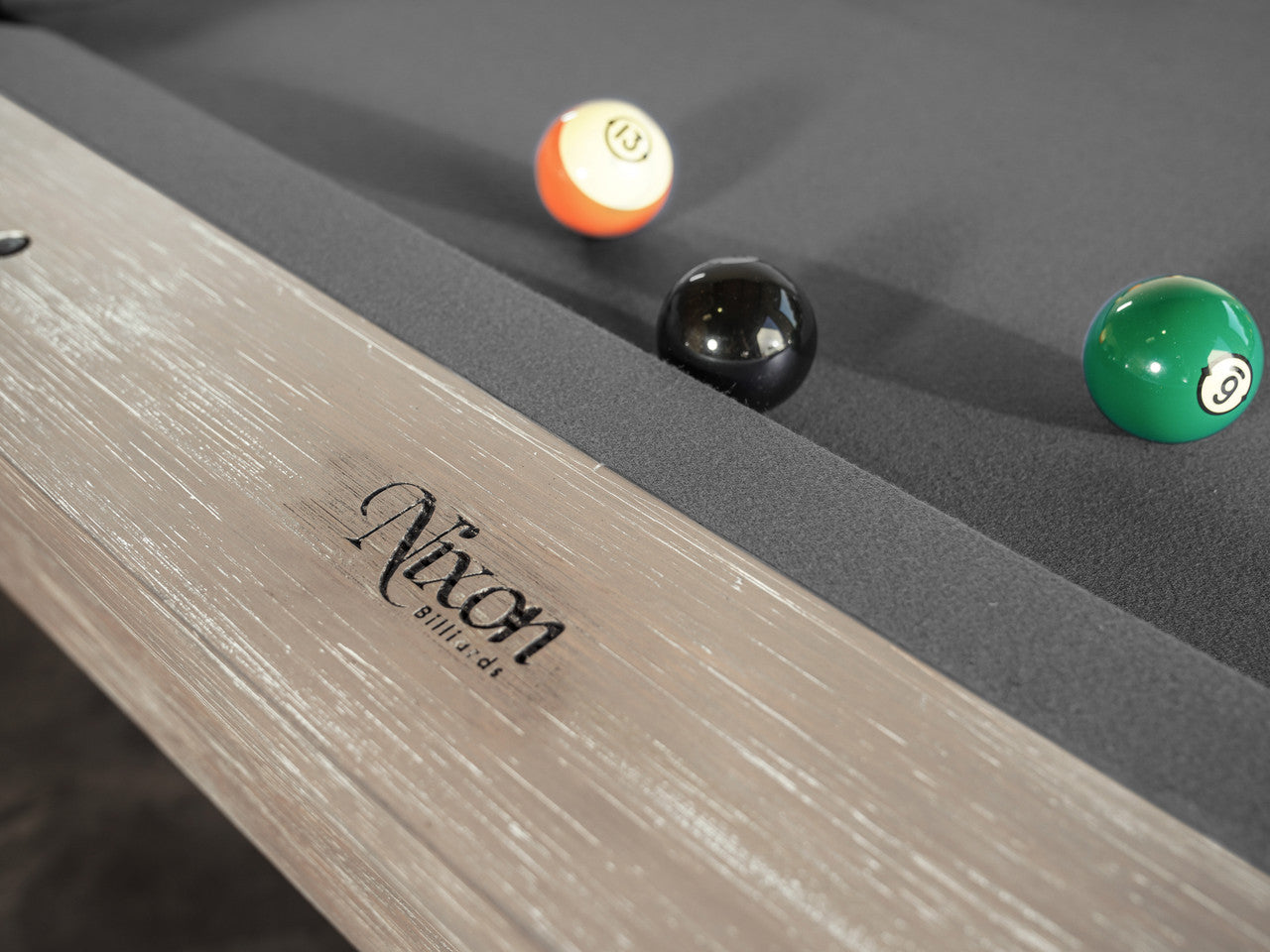 Close-up of Nixon Huck 7' Slate Pool Table by Nixon Billiards, grey white oak finish shown.