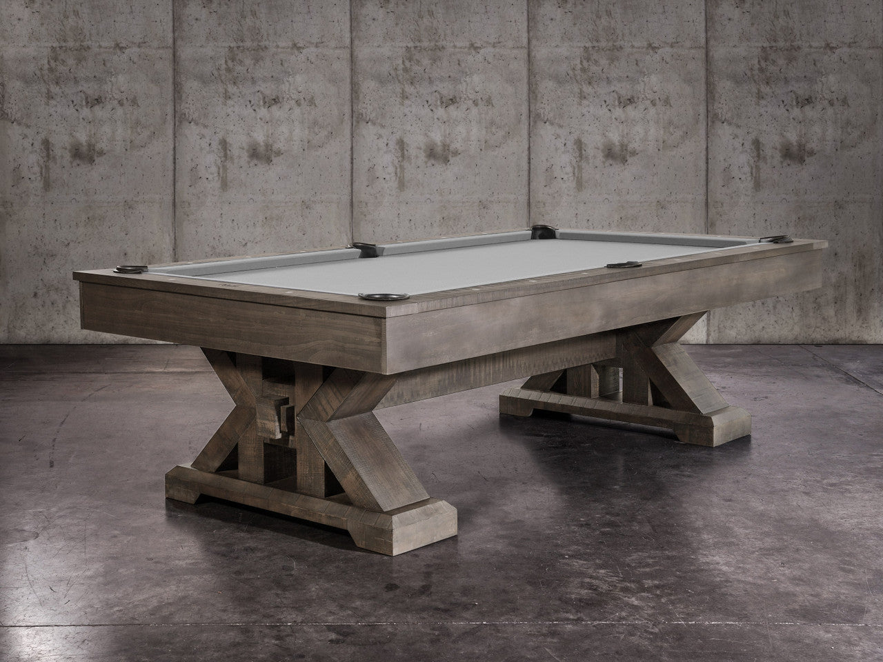 The Nixon Jasper 8' Slate Pool Table by Nixon Billiards features a weathered slate finish and dining top.