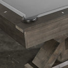 Close-up of a corner pocket on the Nixon Jasper 7' Slate Pool Table in Weathered Slate Finish.