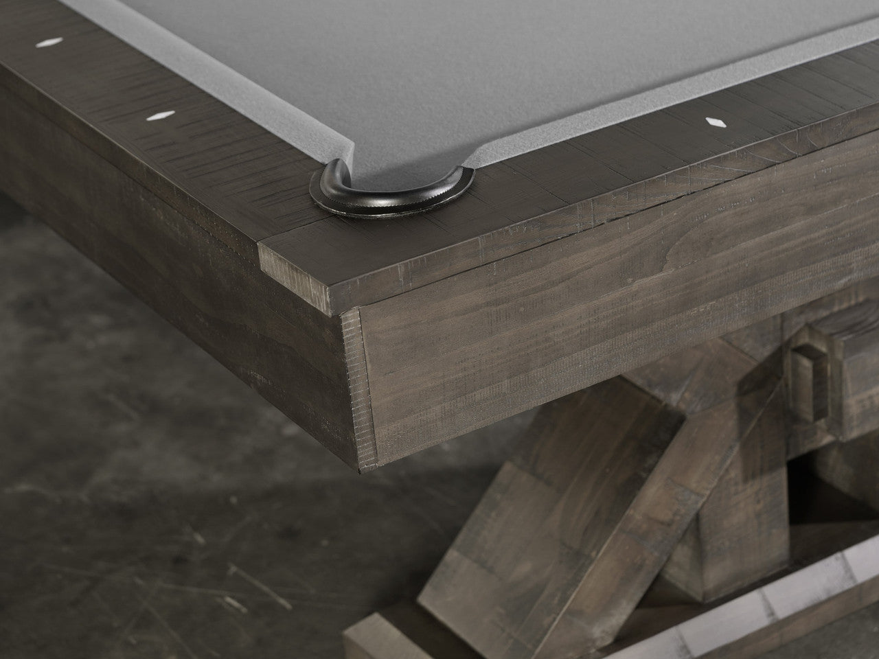Corner pocket of a Nixon Jasper 8’ Slate Pool Table in weathered slate finish by Nixon Billiards.