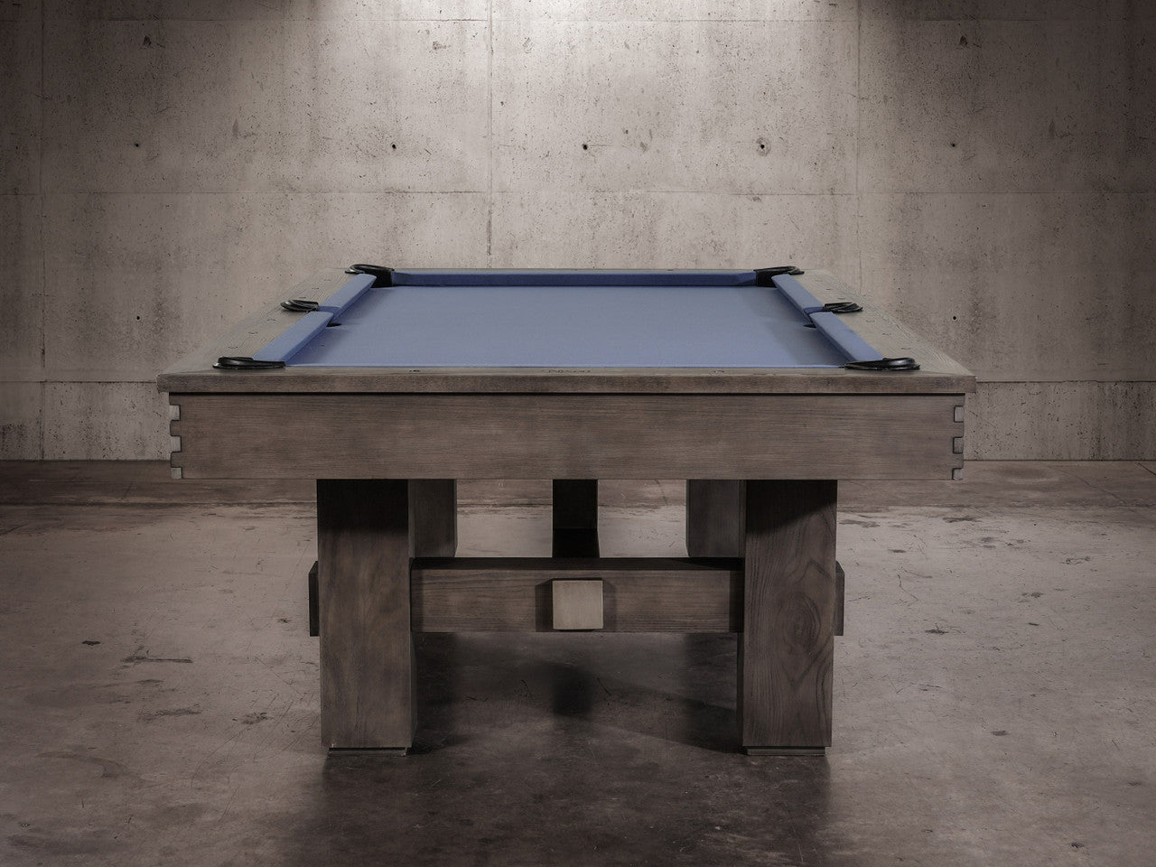 The Nixon Kemp 8' Slate Pool Table by Nixon Billiards features a Grayson Grey finish and blue felt.