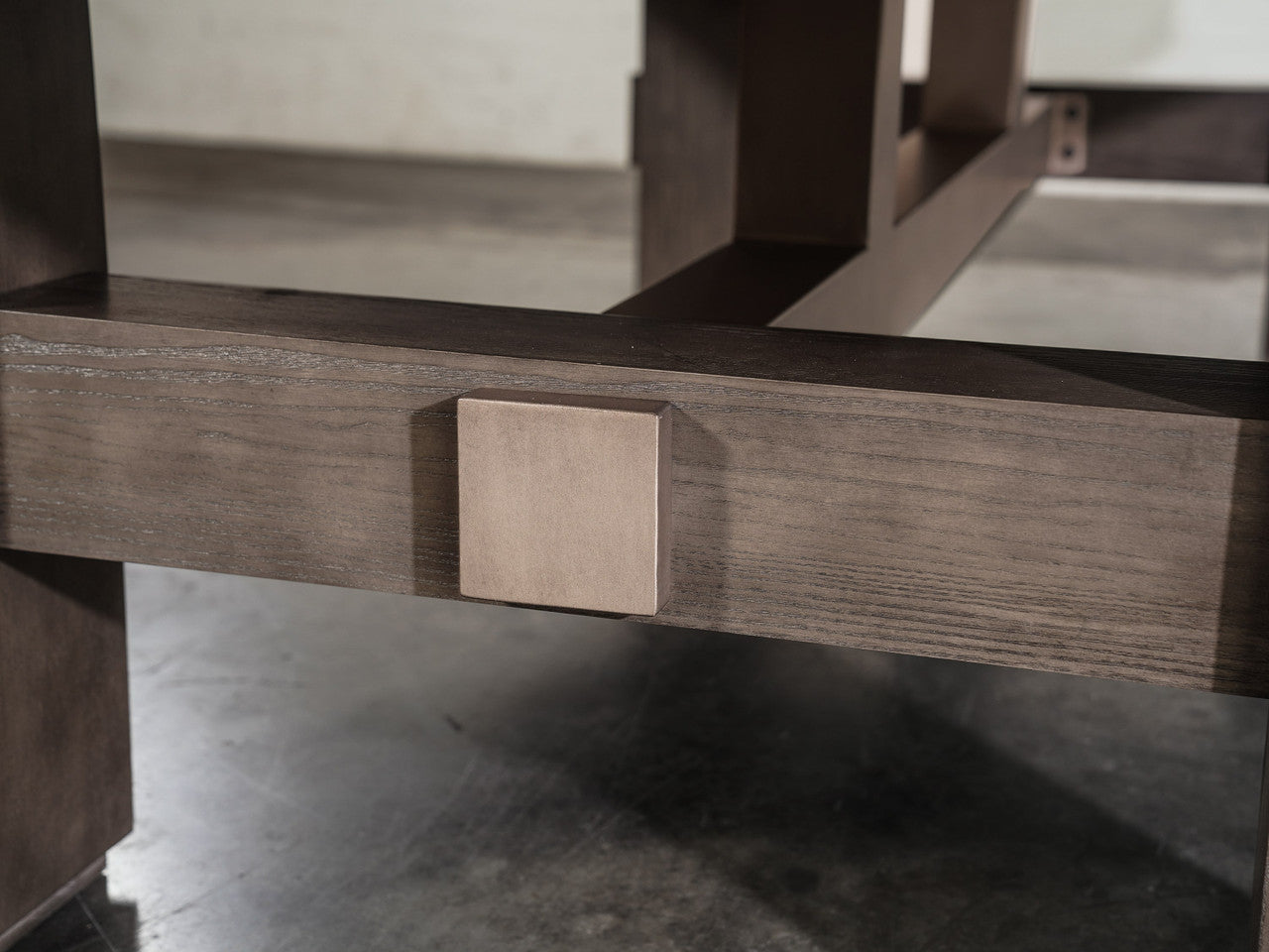 Close-up of Nixon Kemp 8' Slate Pool Table by Nixon Billiards in Grayson Grey on concrete floor.