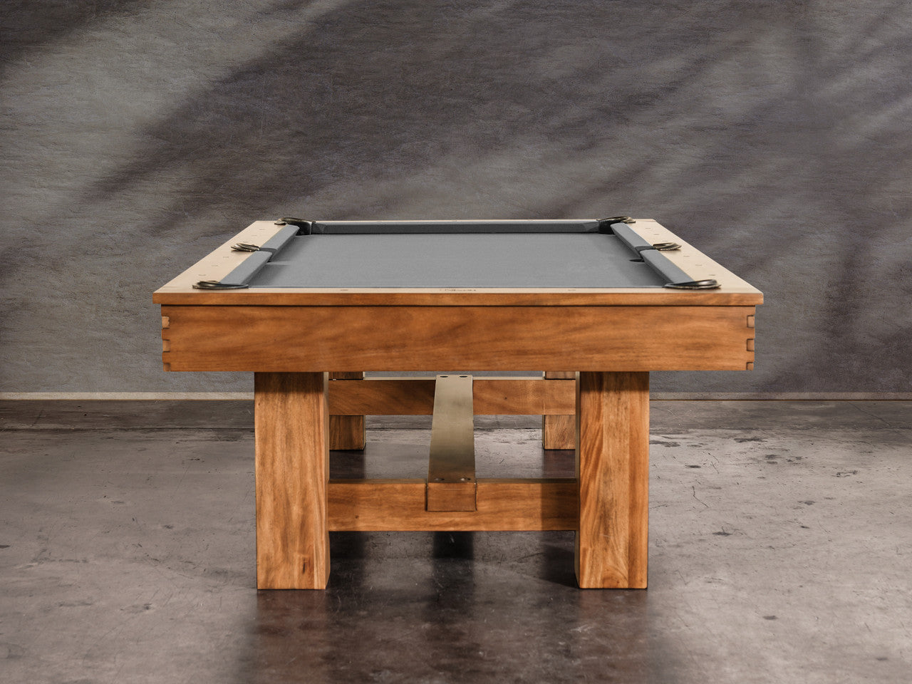The Nixon Presli 8' Slate Pool Table by Nixon Billiards features a Native Acacia finish and gray felt.