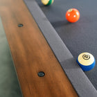 Nixon Presli 8' Slate Pool Table by Nixon Billiards in Native Acacia, balls near table edge.
