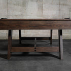 The Nixon Hunter 7' Slate Pool Table by Nixon Billiards in Brushed Walnut sits on concrete floors.