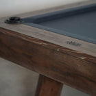 Close-up of Nixon Hunter 7' Slate Pool Table in Brushed Walnut by Nixon Billiards.