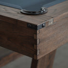 Close-up of Nixon Hunter 7' Slate Pool Table in Brushed Walnut by Nixon Billiards, showing joints.