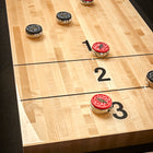Brunswick Billiards Parsons 12' Shuffleboard Table with black and red pucks on zones 1–3.
