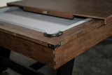 Close-up of a Nixon Hunter 7' Slate Pool Table in Brushed Walnut with dining top partially open.
