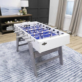 American Legend Manhattan Foosball Table with blue field on striped rug in a modern living room.