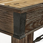 Close-up of Brunswick Billiards Canton 14' Shuffleboard Table in Black Forest with metal accents.