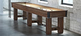 Brunswick Billiards Canton 14' Shuffleboard Table in Black Forest with pucks and powder.