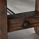 Close-up of Brunswick Billiards Canton 14' Shuffleboard Table legs joined by a dark metal bolt.