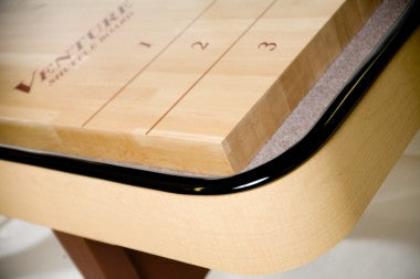 Close-up of the Venture Classic 14' Shuffleboard Table with numbered zones and a sleek black trim.