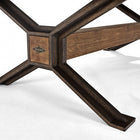 Close-up of Brunswick Billiards Dameron 8' Slate Pool Table in Nutmeg’s cross-shaped base.