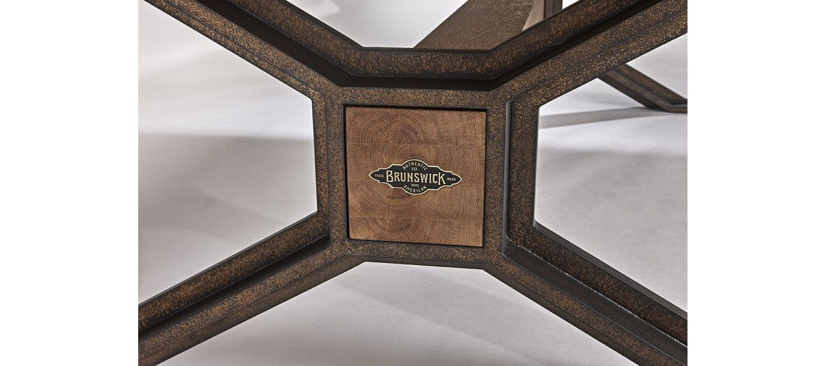 Close-up of Brunswick Billiards Dameron 8' Slate Pool Table in Nutmeg base with logo.