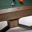 Brunswick Billiards Dameron 8' Slate Pool Table in Nutmeg with green felt, partial corner view.