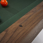Close-up of a Brunswick Billiards Dameron 8' Slate Pool Table in Nutmeg with pool balls.