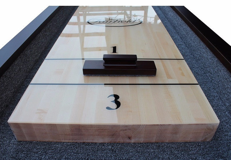 Playcraft St. Lawrence 16' shuffleboard table in chestnut, pro-style with black scoring numbers.