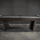 Nixon KAI 7' Slate Pool Table by Nixon Billiards in waxed brown finish on a concrete floor.